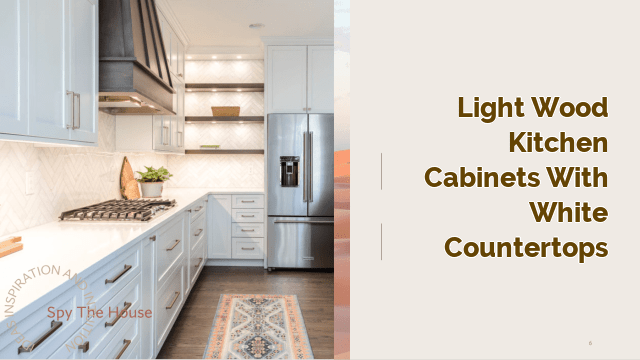 light wood kitchen cabinets with white countertops