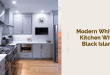 modern white kitchen with black island