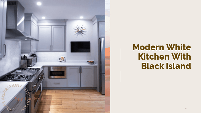modern white kitchen with black island