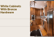 white cabinets with bronze hardware
